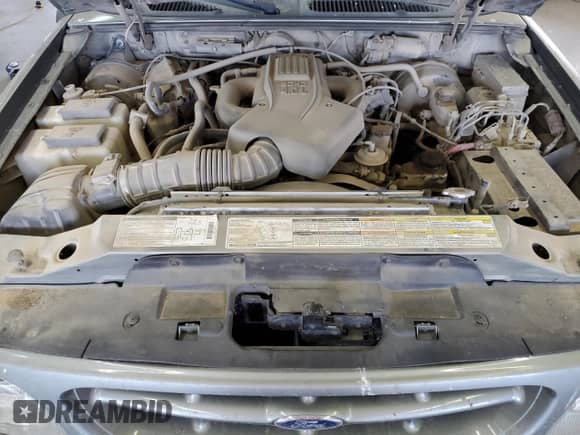 2000 Ford Explorer Limited with VIN 1FMDU75EXYZA41631, listed as a Copart auction lot 63808935 with 221,084 mi miles and Salvage title. Bid and sale history available at DreamBid. Image 12.