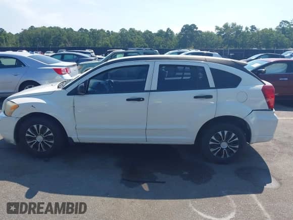 2007 Dodge Caliber with VIN 1B3HB28B47D286521, listed as a IAAI auction lot 42887649 with 200,237 mi miles and . Bid and sale history available at DreamBid. Image 14.