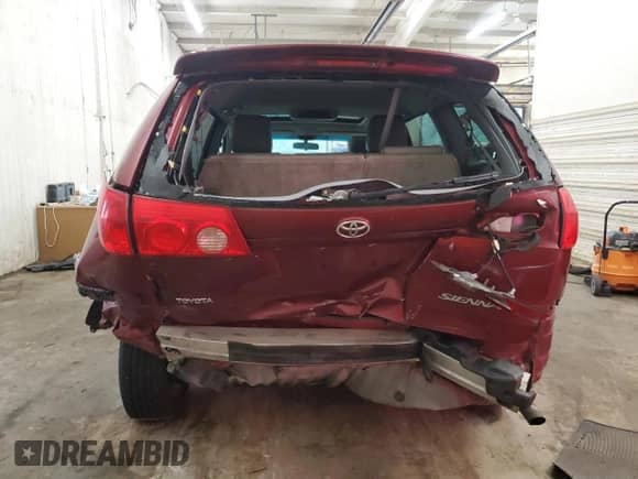 2010 Toyota Sienna XLE с VIN 5TDYK4CC9AS298444, выставлен на аукционе Copart как лот 69422175 с пробегом 245 524 миль миль и Списание • Salvage title. История ставок и продаж доступна на DreamBid. Изображение 6.