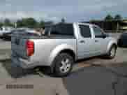 2005 Nissan Frontier LE с VIN 1N6AD07W75C465199, выставлен на аукционе Copart как лот 63860845 с пробегом 149 763 миль миль и Чистый • Clean title. История ставок и продаж доступна на DreamBid. Изображение 3.