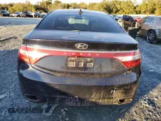 2013 Hyundai Azera с VIN KMHFG4JG8DA227134, выставлен на аукционе Copart как лот 81107294 с пробегом 190 511 миль миль и Списание • Salvage title. История ставок и продаж доступна на DreamBid. Изображение 6.