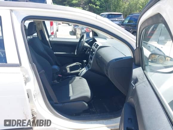 2008 Dodge Caliber SE with VIN 1B3HB28B28D718413, listed as a IAAI auction lot 42775246 with 101,516 mi miles and . Bid and sale history available at DreamBid. Image 5.