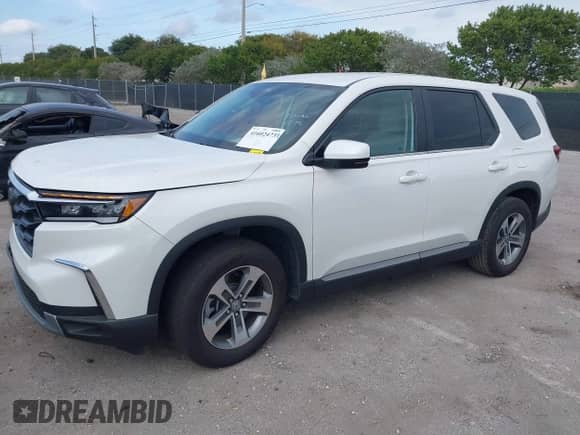 2025 Honda Pilot EX-L z VIN 5FNYG2H40SB009867, wystawiony jako IAAI lot #41602473 z przebiegiem 4 865 mil mil oraz . Historia ofert i sprzedaży dostępna na DreamBid. Obrazek 2.