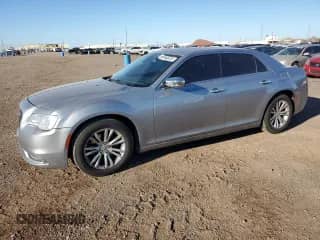 2016 Chrysler 300 C with VIN 2C3CCAEG8GH216589, listed as a Copart auction lot 81946705 with 152,933 mi miles and Salvage title. Bid and sale history available at DreamBid. Image 1.