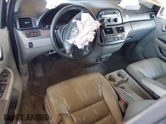 2007 Honda Odyssey EX-L z VIN 5FNRL38617B098931, wystawiony jako Copart lot #67090875 z przebiegiem Nie podano mil oraz Szkoda całkowita • Salvage title. Historia ofert i sprzedaży dostępna na DreamBid. Obrazek 8.