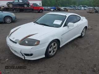 2006 Hyundai Tiburon GS с VIN KMHHM65D96U229831, выставлен на аукционе IAAI как лот 42093469 с пробегом 277 108 миль миль и . История ставок и продаж доступна на DreamBid. Изображение 2.