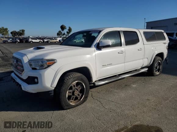 2016 Toyota Tacoma TRD Sport with VIN 3TMBZ5DN9GM001172, listed as a Copart auction lot 86475475 with 92,598 mi miles and Salvage title. Bid and sale history available at DreamBid. Image 1.