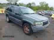 2003 Jeep Grand Cherokee Laredo with VIN 1J4GW48S23C610697, listed as a IAAI auction lot 43178617 with 227,331 mi miles and . Bid and sale history available at DreamBid. Image 1.