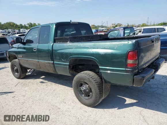 2002 Dodge 2500 with VIN 3B7KF23622M281527, listed as a Copart auction lot 70297065 with 317,620 mi miles and Salvage title. Bid and sale history available at DreamBid. Image 2.