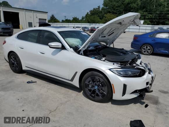 2023 BMW i4 eDrive40 with VIN WBY73AW03PFR24456, listed as a Copart auction lot 62316655 with 16,655 mi miles and Salvage title. Bid and sale history available at DreamBid. Image 4.