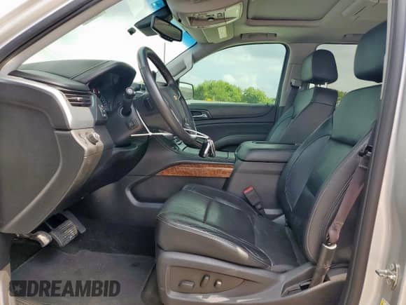 2017 Chevrolet Tahoe Premier with VIN 1GNSCCKC0HR158734, listed as a Copart auction lot 71042885 with 127,552 mi miles and Salvage title. Bid and sale history available at DreamBid. Image 7.