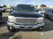2005 GMC Sierra 1500 SLT with VIN 1GTEC19T35Z138635, listed as a Copart auction lot 87394204 with 115,591 mi miles and Salvage title. Bid and sale history available at DreamBid. Image 5.