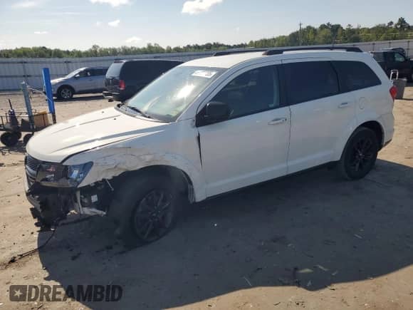 2019 Dodge Journey SE with VIN 3C4PDCBB8KT833943, listed as a Copart auction lot 68223735 with 144,158 mi miles and Salvage title. Bid and sale history available at DreamBid. Image 1.