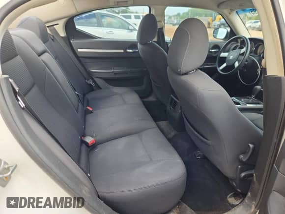 2010 Dodge Charger SXT with VIN 2B3CA3CV2AH198288, listed as a Copart auction lot 84467895 with 156,735 mi miles and Salvage title. Bid and sale history available at DreamBid. Image 10.