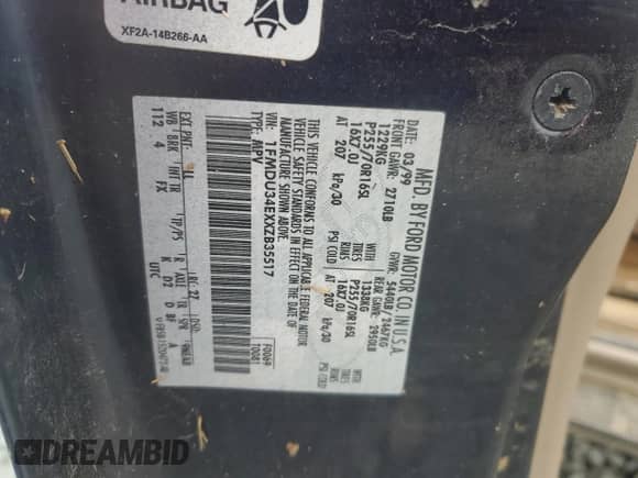 1999 Ford Explorer XLT with VIN 1FMDU34EXXZB35517, listed as a Copart auction lot 64431625 with 111,443 mi miles and Salvage title. Bid and sale history available at DreamBid. Image 12.