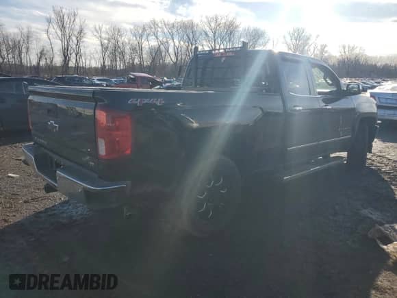 2017 Chevrolet Silverado 1500 LTZ with VIN 1GCVKSEC5HZ110225, listed as a Copart auction lot 46704345 with 129,445 mi miles and Salvage title. Bid and sale history available at DreamBid. Image 3.