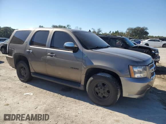2011 Chevrolet Tahoe с VIN 1GNSKDFJ2BR259279, выставлен на аукционе Copart как лот 41371235 с пробегом 182 212 миль миль и Списание • Salvage title. История ставок и продаж доступна на DreamBid. Изображение 4.