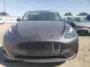 2023 Tesla Model Y Long Range with VIN 7SAYGDEE2PF749195, listed as a Copart auction lot 68607974 with 14,653 mi miles and Salvage title. Bid and sale history available at DreamBid. Image 5.