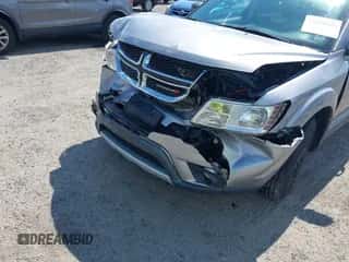 2015 Dodge Journey SXT with VIN 3C4PDDBG6FT651438, listed as a IAAI auction lot 43148226 with 127,934 mi miles and . Bid and sale history available at DreamBid. Image 6.