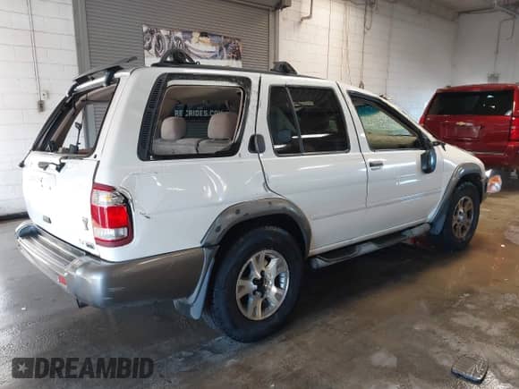 2001 Nissan Pathfinder LE with VIN JN8DR09X41W563935, listed as a IAAI auction lot 41367396 with 287,475 mi miles and . Bid and sale history available at DreamBid. Image 4.