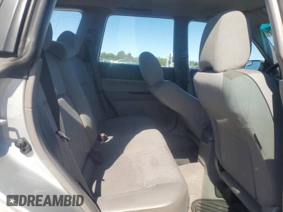 2004 Subaru Forester X with VIN JF1SG63664H744285, listed as a Copart auction lot 71876025 with 118,309 mi miles and Salvage title. Bid and sale history available at DreamBid. Image 11.