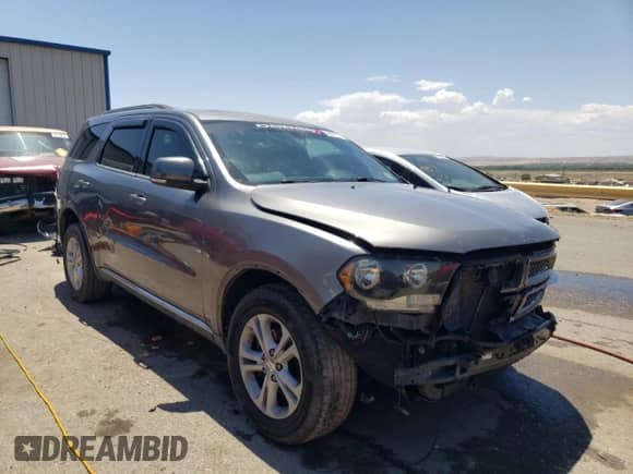 2011 Dodge Durango Crew with VIN 1D4RD4GG9BC740334, listed as a Copart auction lot 59697313 with 163,267 mi miles and Salvage title. Bid and sale history available at DreamBid. Image 4.
