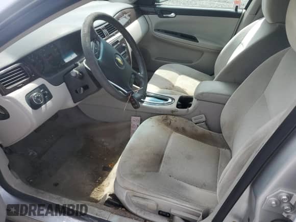 2015 Chevrolet Impala LS с VIN 2G1WA5E31F1125201, выставлен на аукционе Copart как лот 60669215 с пробегом 121 597 миль миль и Списание • Salvage title. История ставок и продаж доступна на DreamBid. Изображение 7.