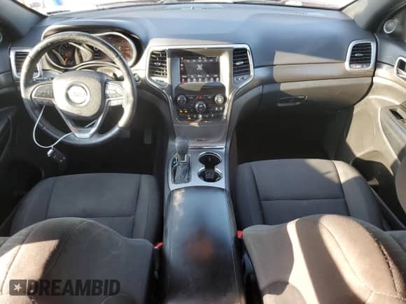 2018 Jeep Grand Cherokee Laredo z VIN 1C4RJEAG8JC402748, wystawiony jako Copart lot #61215185 z przebiegiem 40 152 mil mil oraz Szkoda całkowita • Salvage title. Historia ofert i sprzedaży dostępna na DreamBid. Obrazek 8.