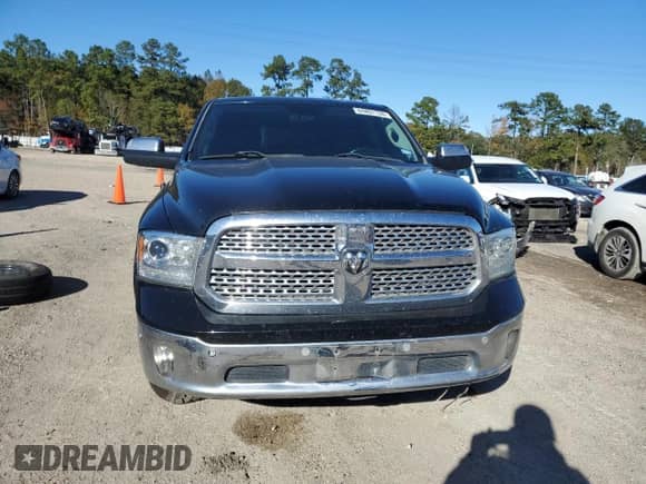 2014 Ram 1500 Laramie with VIN 1C6RR6NTXES287384, listed as a Copart auction lot 84891134 with 200,479 mi miles and Salvage title. Bid and sale history available at DreamBid. Image 5.
