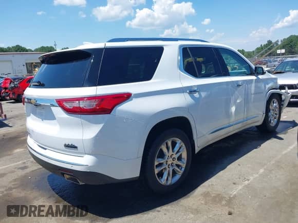 2021 Chevrolet Traverse High Country с VIN 1GNEVNKW4MJ213028, выставлен на аукционе IAAI как лот 42557635 с пробегом 70 307 миль миль и . История ставок и продаж доступна на DreamBid. Изображение 4.