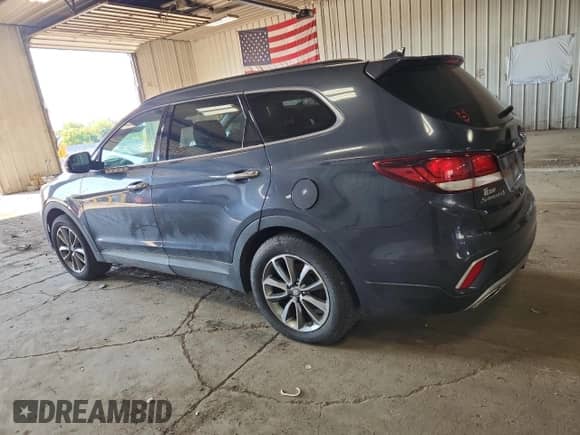 2017 Hyundai Santa Fe SE z VIN KM8SM4HF1HU167240, wystawiony jako Copart lot #82233795 z przebiegiem 130 076 mil mil oraz Czysty tytuł • Clean title. Historia ofert i sprzedaży dostępna na DreamBid. Obrazek 2.