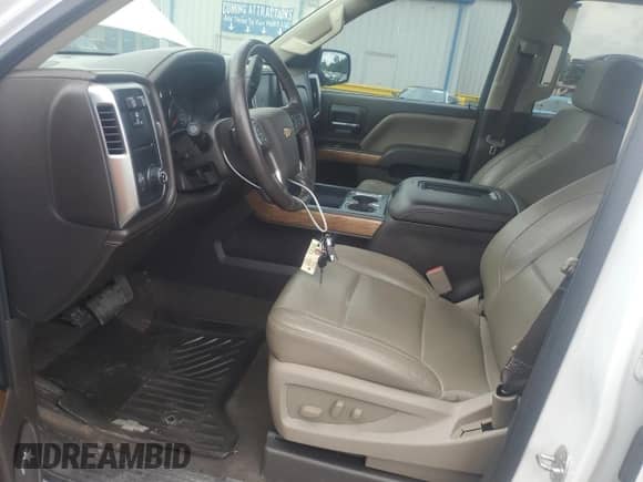 2017 Chevrolet Silverado 1500 LTZ with VIN 3GCPCSEC3HG191151, listed as a Copart auction lot 58218795 with 134,276 mi miles and Salvage title. Bid and sale history available at DreamBid. Image 7.