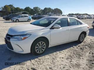 2016 Toyota Camry LE с VIN 4T4BF1FKXGR566757, выставлен на аукционе Copart как лот 86405495 с пробегом 120 467 миль миль и Списание • Salvage title. История ставок и продаж доступна на DreamBid. Изображение 1.