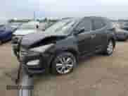 2016 Hyundai Santa Fe with VIN 5XYZWDLA3GG313033, listed as a Copart auction lot 81083655 with 114,235 mi miles and Salvage title. Bid and sale history available at DreamBid. Image 1.