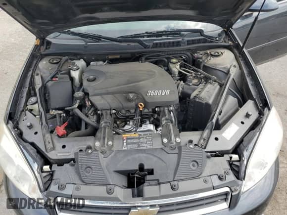 2011 Chevrolet Impala LS Fleet z VIN 2G1WF5EK2B1112881, wystawiony jako Copart lot #70709675 z przebiegiem 87 095 mil mil oraz Szkoda całkowita • Salvage title. Historia ofert i sprzedaży dostępna na DreamBid. Obrazek 11.