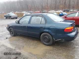 2000 Chevrolet Prizm z VIN 1Y1SK528XYZ418233, wystawiony jako Copart lot #83036344 z przebiegiem Nie podano mil oraz Szkoda całkowita • Salvage title. Historia ofert i sprzedaży dostępna na DreamBid. Obrazek 2.