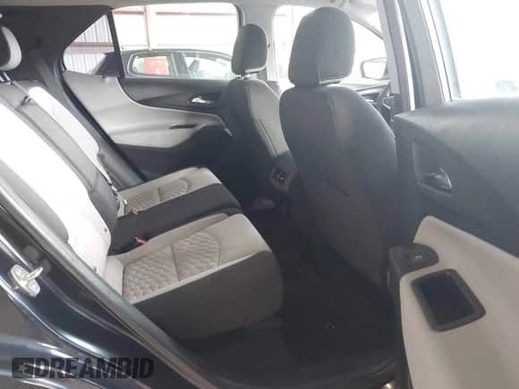 2020 Chevrolet Equinox LS z VIN 2GNAXSEV7L6181858, wystawiony jako IAAI lot #42783166 z przebiegiem 69 750 mil mil oraz . Historia ofert i sprzedaży dostępna na DreamBid. Obrazek 8.