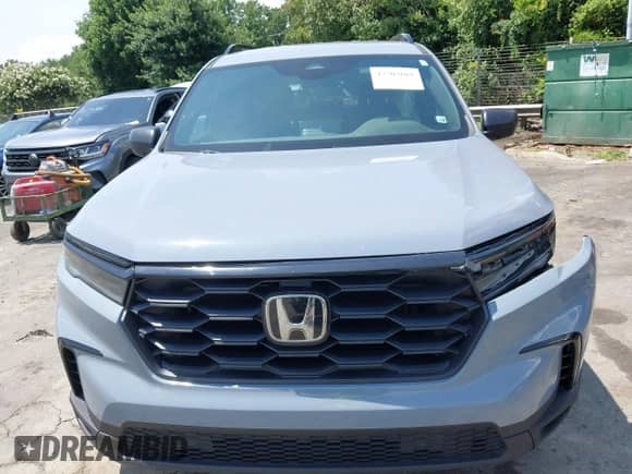2023 Honda Pilot Sport z VIN 5FNYG1H31PB052865, wystawiony jako IAAI lot #42503668 z przebiegiem 23 349 mil mil oraz . Historia ofert i sprzedaży dostępna na DreamBid. Obrazek 12.