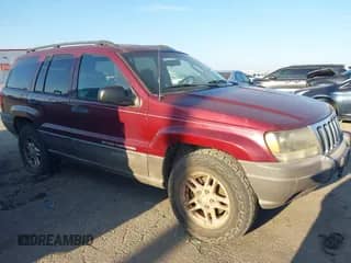 2003 Jeep Grand Cherokee Laredo z VIN 1J4GX48S83C551023, wystawiony jako IAAI lot #43186986 z przebiegiem 176 490 mil mil oraz . Historia ofert i sprzedaży dostępna na DreamBid. Obrazek 1.