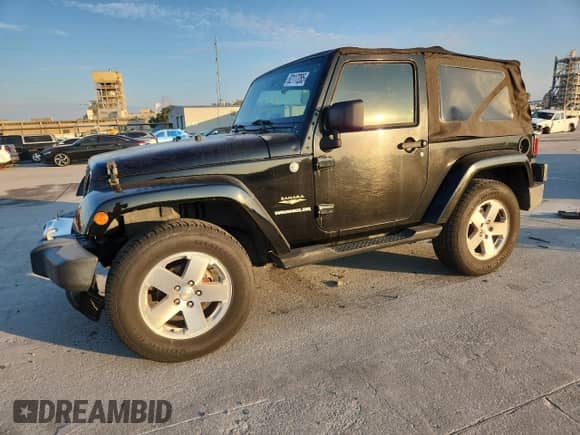 2008 Jeep Wrangler Sahara с VIN 1J8FA54158L589606, выставлен на аукционе Copart как лот 82117285 с пробегом 143 741 миль миль и Чистый • Clean title. История ставок и продаж доступна на DreamBid. Изображение 1.