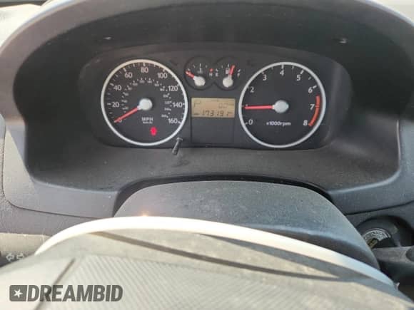 2003 Hyundai Tiburon GT с VIN KMHHN65F13U071950, выставлен на аукционе Copart как лот 62307475 с пробегом 173 191 миль миль и Списание • Salvage title. История ставок и продаж доступна на DreamBid. Изображение 9.