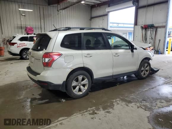2014 Subaru Forester Limited z VIN JF2SJAHC6EH413237, wystawiony jako Copart lot #89618935 z przebiegiem Nie podano mil oraz Szkoda całkowita • Salvage title. Historia ofert i sprzedaży dostępna na DreamBid. Obrazek 3.