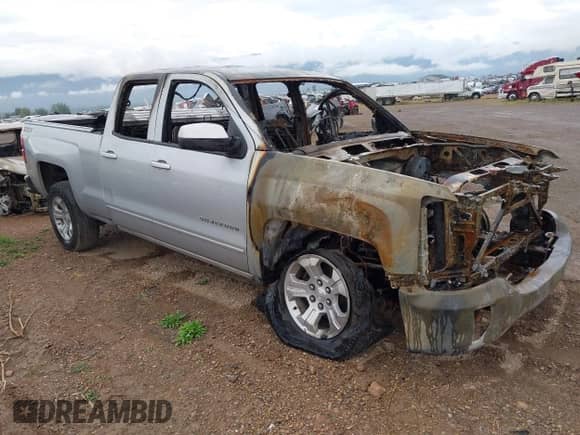 2019 Chevrolet Silverado 1500 LT with VIN 2GCVKPEC1K1169432, listed as a IAAI auction lot 43174619 with 99,402 mi miles and . Bid and sale history available at DreamBid. Image 1.