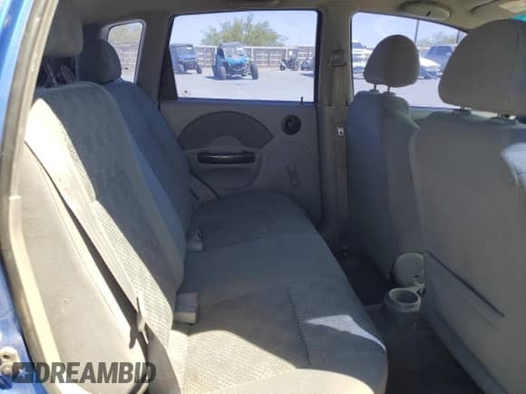 2005 Chevrolet Aveo LS с VIN KL1TD62695B303190, выставлен на аукционе Copart как лот 54049815 с пробегом 143 668 миль миль и Списание • Salvage title. История ставок и продаж доступна на DreamBid. Изображение 10.