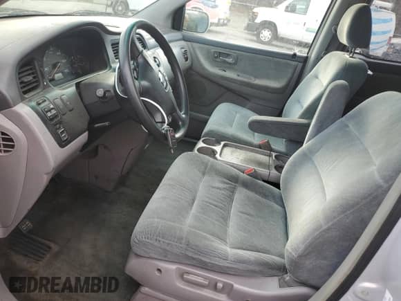 2002 Honda Odyssey EX с VIN 5FNRL18662B054002, выставлен на аукционе Copart как лот 86274695 с пробегом 210 011 миль миль и Списание • Salvage title. История ставок и продаж доступна на DreamBid. Изображение 7.