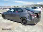 2021 Toyota Camry Hybrid XSE with VIN 4T1K31AK9MU565539, listed as a Copart auction lot 86149585 with 115,658 mi miles and Salvage title. Bid and sale history available at DreamBid. Image 2.