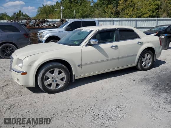 2005 Chrysler 300 300C AWD with VIN 2C3JK63HX5H647421, listed as a Copart auction lot 81134595 with 179,457 mi miles and Salvage title. Bid and sale history available at DreamBid. Image 1.