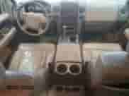 2005 Ford F-150 XLT with VIN 1FTPW14555FA77699, listed as a Copart auction lot 82618235 with 243,338 mi miles and Clean title. Bid and sale history available at DreamBid. Image 8.