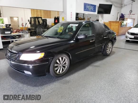 2006 Hyundai Azera SE с VIN KMHFC46F46A056168, выставлен на аукционе Copart как лот 85765045 с пробегом 103 335 миль миль и Чистый • Clean title. История ставок и продаж доступна на DreamBid. Изображение 1.