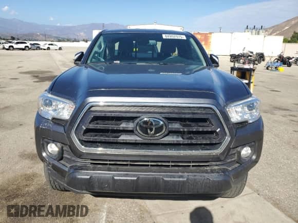 2022 Toyota Tacoma SR z VIN 3TYSZ5AN6NT095677, wystawiony jako Copart lot #84992975 z przebiegiem 25 953 mil mil oraz Szkoda całkowita • Salvage title. Historia ofert i sprzedaży dostępna na DreamBid. Obrazek 5.